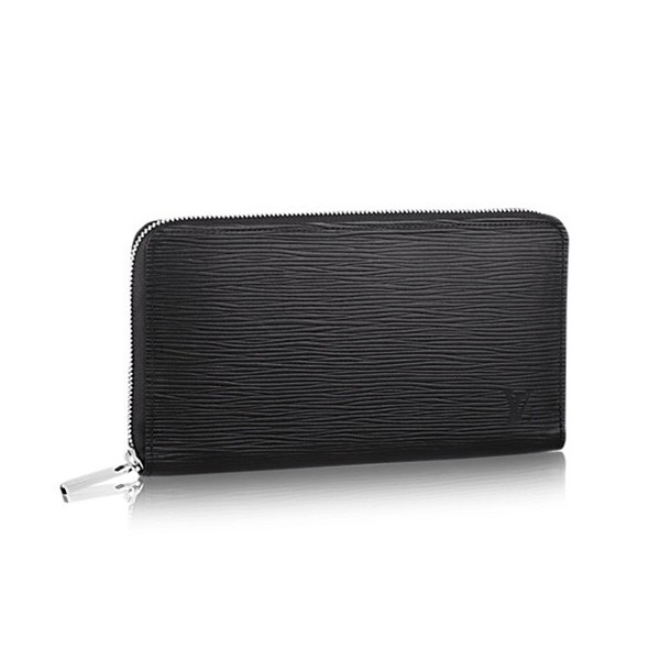 FEAFED56-2E8F-F8C6-A395-8927B3B235BD Wallet M60632. - Image 1